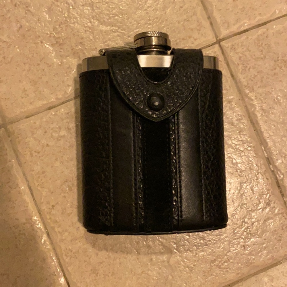 Coach leather bounded flask